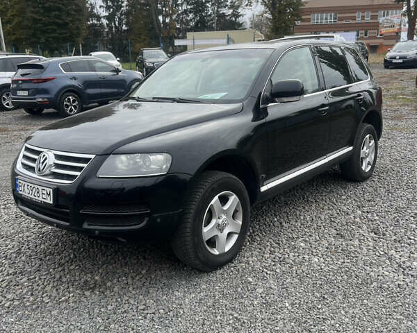 Чорний Фольксваген Туарег, об'ємом двигуна 2.46 л та пробігом 190 тис. км за 8800 $, фото 1 на Automoto.ua