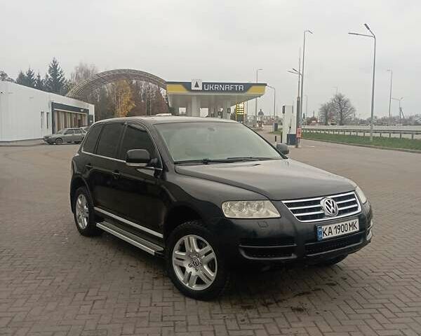 Черный Фольксваген Туарег, объемом двигателя 4.17 л и пробегом 316 тыс. км за 7500 $, фото 1 на Automoto.ua