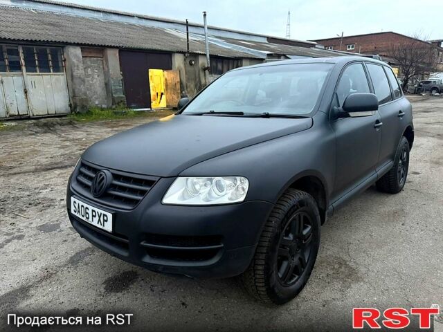 Чорний Фольксваген Туарег, об'ємом двигуна 3 л та пробігом 277 тис. км за 4300 $, фото 1 на Automoto.ua