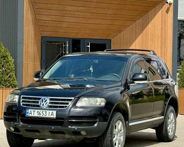 Черный Фольксваген Туарег, объемом двигателя 2.97 л и пробегом 260 тыс. км за 9500 $, фото 1 на Automoto.ua