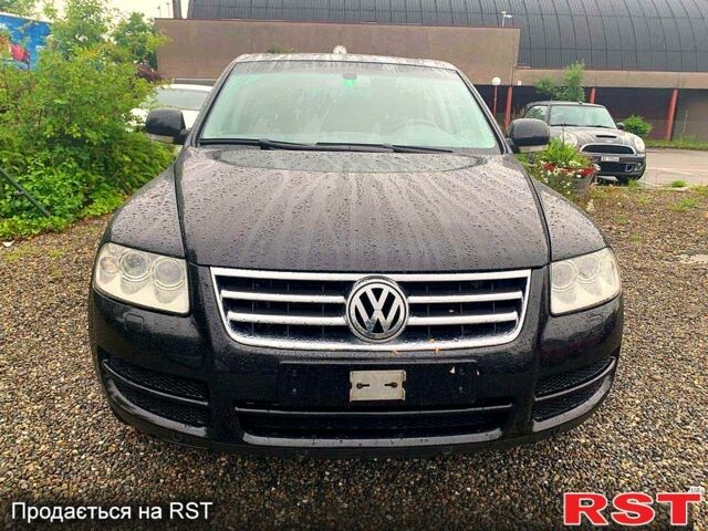 Черный Фольксваген Туарег, объемом двигателя 2.5 л и пробегом 218 тыс. км за 6500 $, фото 1 на Automoto.ua