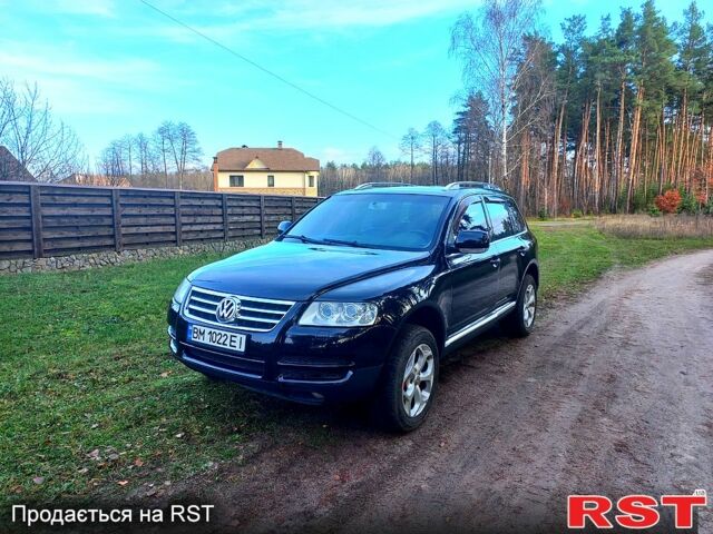 Черный Фольксваген Туарег, объемом двигателя 3.2 л и пробегом 270 тыс. км за 6650 $, фото 1 на Automoto.ua