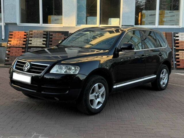 Чорний Фольксваген Туарег, об'ємом двигуна 2.5 л та пробігом 300 тис. км за 4900 $, фото 1 на Automoto.ua