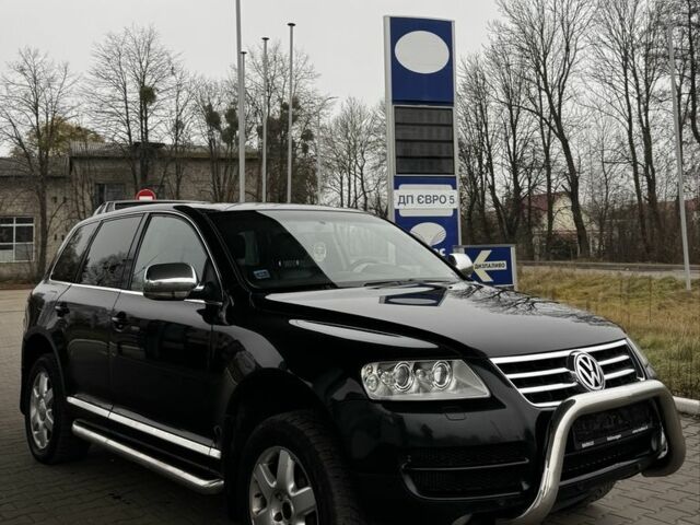 Чорний Фольксваген Туарег, об'ємом двигуна 3 л та пробігом 320 тис. км за 5200 $, фото 1 на Automoto.ua