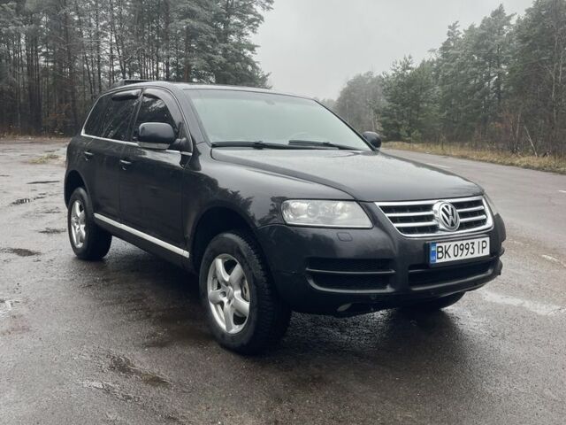 Чорний Фольксваген Туарег, об'ємом двигуна 2.5 л та пробігом 351 тис. км за 10000 $, фото 1 на Automoto.ua