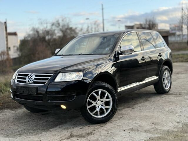 Черный Фольксваген Туарег, объемом двигателя 2.5 л и пробегом 232 тыс. км за 5750 $, фото 1 на Automoto.ua