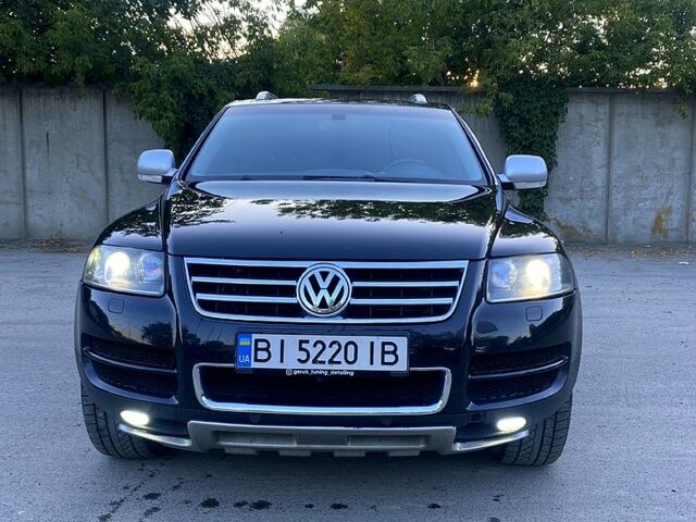 Черный Фольксваген Туарег, объемом двигателя 3 л и пробегом 340 тыс. км за 10800 $, фото 1 на Automoto.ua