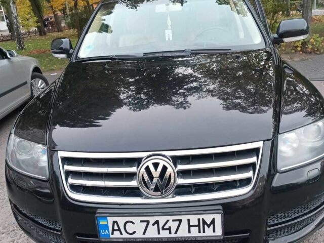 Чорний Фольксваген Туарег, об'ємом двигуна 3 л та пробігом 285 тис. км за 8500 $, фото 1 на Automoto.ua