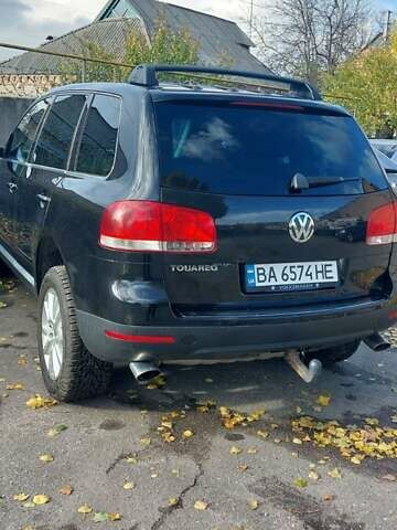 Чорний Фольксваген Туарег, об'ємом двигуна 2.99 л та пробігом 322 тис. км за 10500 $, фото 1 на Automoto.ua