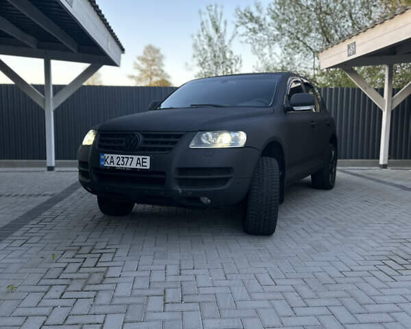 Чорний Фольксваген Туарег, об'ємом двигуна 3.2 л та пробігом 520 тис. км за 7600 $, фото 1 на Automoto.ua