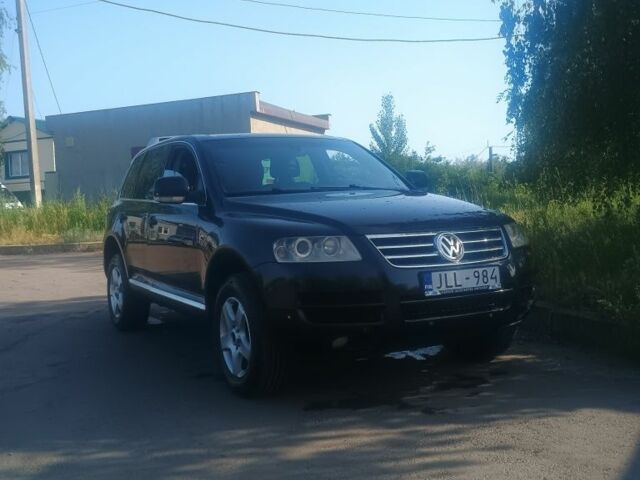 Черный Фольксваген Туарег, объемом двигателя 2.5 л и пробегом 271 тыс. км за 6000 $, фото 1 на Automoto.ua