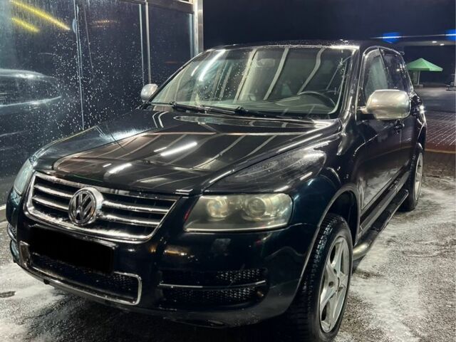Чорний Фольксваген Туарег, об'ємом двигуна 3 л та пробігом 450 тис. км за 4950 $, фото 1 на Automoto.ua