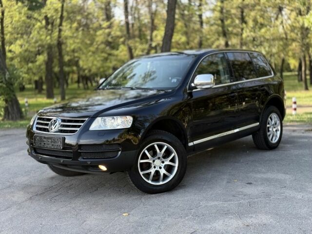 Черный Фольксваген Туарег, объемом двигателя 2.5 л и пробегом 232 тыс. км за 5950 $, фото 1 на Automoto.ua