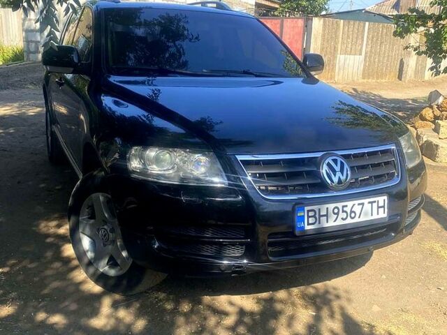 Черный Фольксваген Туарег, объемом двигателя 3 л и пробегом 380 тыс. км за 8200 $, фото 1 на Automoto.ua