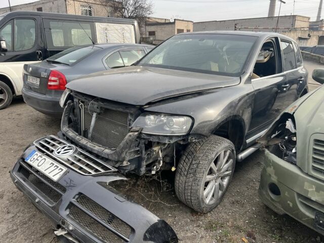 Чорний Фольксваген Туарег, об'ємом двигуна 3 л та пробігом 127 тис. км за 1599 $, фото 1 на Automoto.ua