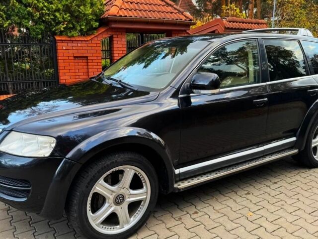 Черный Фольксваген Туарег, объемом двигателя 3 л и пробегом 280 тыс. км за 3100 $, фото 1 на Automoto.ua