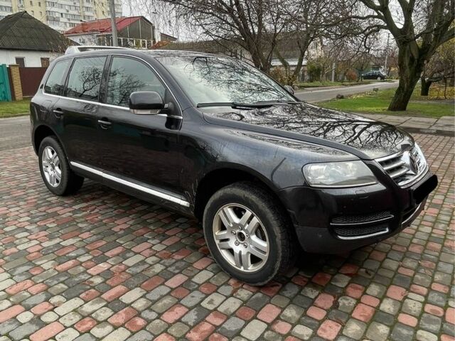 Черный Фольксваген Туарег, объемом двигателя 3 л и пробегом 270 тыс. км за 6500 $, фото 1 на Automoto.ua