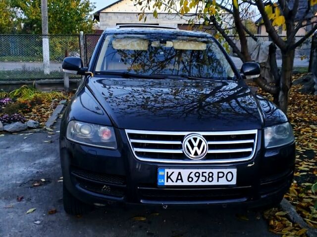 Черный Фольксваген Туарег, объемом двигателя 3.6 л и пробегом 255 тыс. км за 8288 $, фото 1 на Automoto.ua