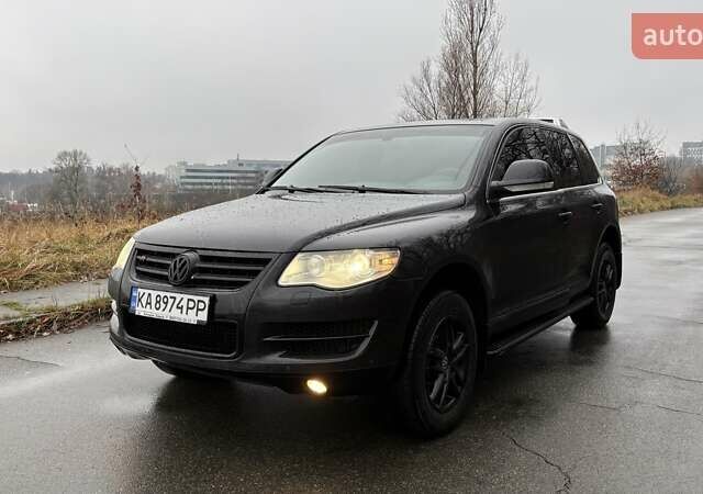 Черный Фольксваген Туарег, объемом двигателя 3 л и пробегом 239 тыс. км за 10300 $, фото 1 на Automoto.ua