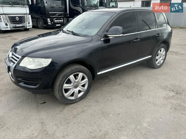 Черный Фольксваген Туарег, объемом двигателя 3 л и пробегом 320 тыс. км за 6300 $, фото 1 на Automoto.ua