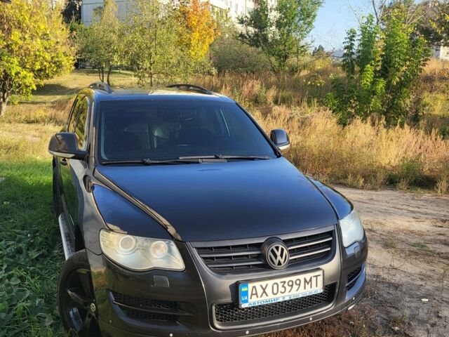 Черный Фольксваген Туарег, объемом двигателя 3 л и пробегом 270 тыс. км за 9500 $, фото 1 на Automoto.ua
