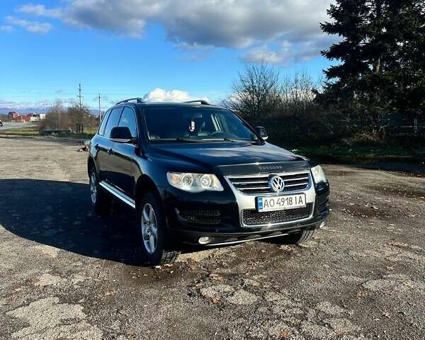 Черный Фольксваген Туарег, объемом двигателя 3 л и пробегом 266 тыс. км за 11500 $, фото 1 на Automoto.ua