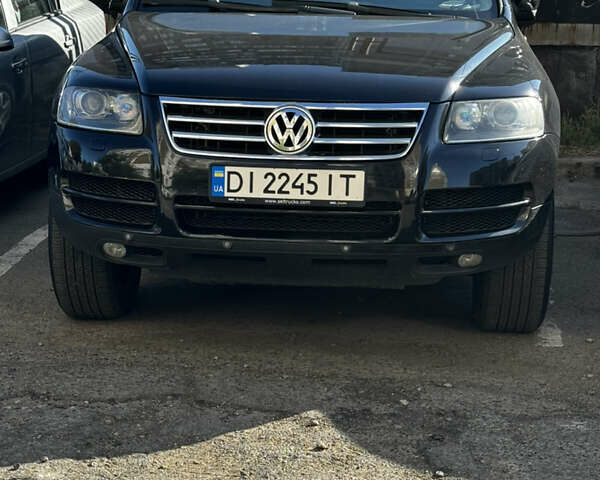 Черный Фольксваген Туарег, объемом двигателя 3.58 л и пробегом 300 тыс. км за 8000 $, фото 1 на Automoto.ua