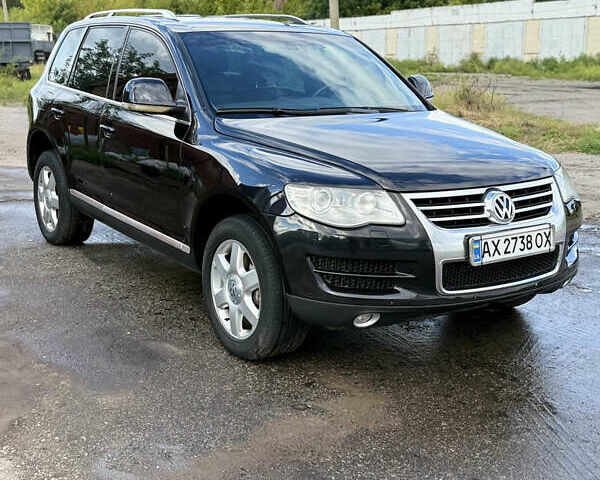 Черный Фольксваген Туарег, объемом двигателя 2.97 л и пробегом 340 тыс. км за 11500 $, фото 1 на Automoto.ua