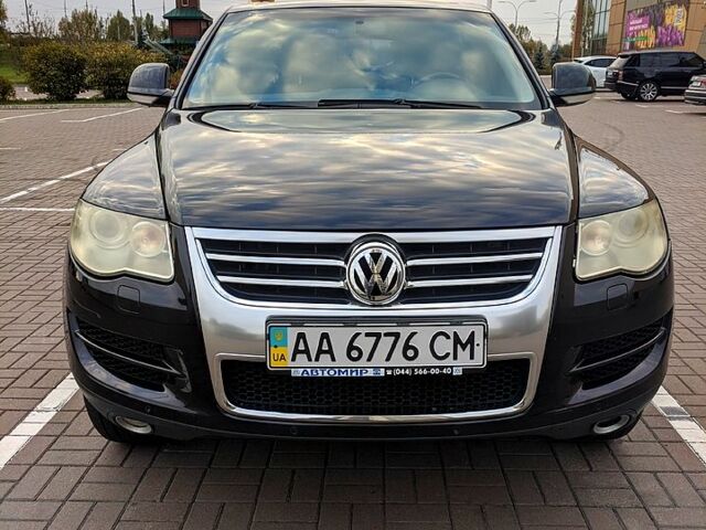 Чорний Фольксваген Туарег, об'ємом двигуна 3 л та пробігом 198 тис. км за 11300 $, фото 1 на Automoto.ua