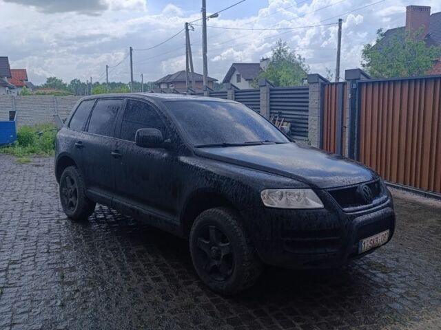 Черный Фольксваген Туарег, объемом двигателя 3 л и пробегом 320 тыс. км за 4400 $, фото 1 на Automoto.ua