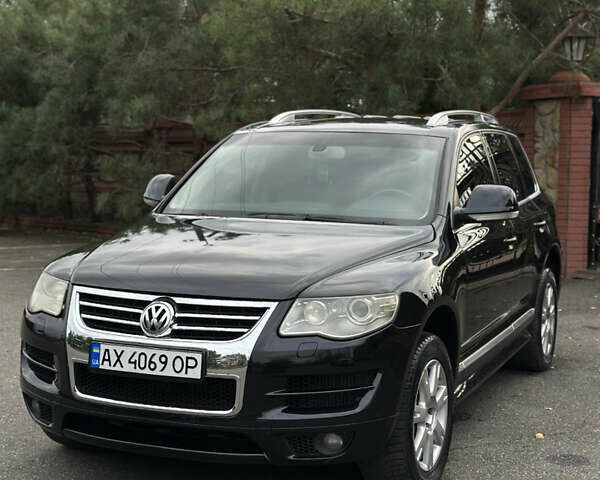 Черный Фольксваген Туарег, объемом двигателя 4.9 л и пробегом 340 тыс. км за 7900 $, фото 1 на Automoto.ua