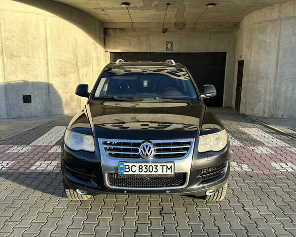 Чорний Фольксваген Туарег, об'ємом двигуна 3 л та пробігом 380 тис. км за 10500 $, фото 1 на Automoto.ua