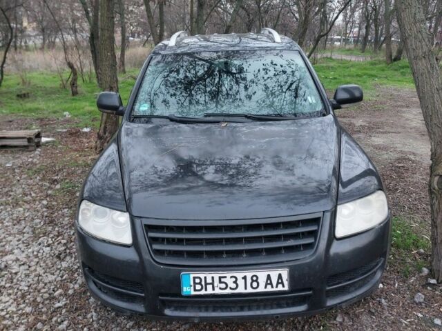 Черный Фольксваген Туарег, объемом двигателя 3 л и пробегом 680 тыс. км за 3000 $, фото 1 на Automoto.ua