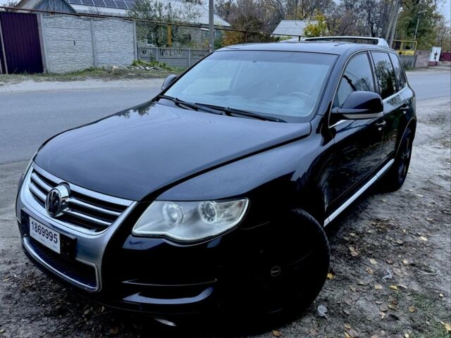 Черный Фольксваген Туарег, объемом двигателя 3 л и пробегом 332 тыс. км за 7048 $, фото 1 на Automoto.ua