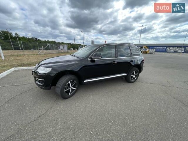 Чорний Фольксваген Туарег, об'ємом двигуна 2.97 л та пробігом 345 тис. км за 11500 $, фото 1 на Automoto.ua