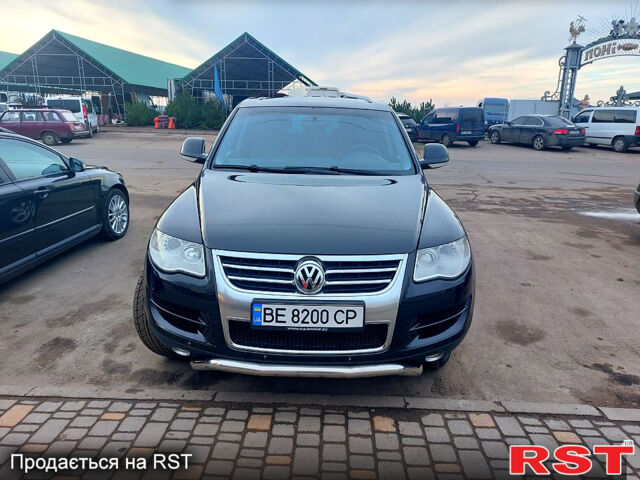 Чорний Фольксваген Туарег, об'ємом двигуна 3 л та пробігом 404 тис. км за 9500 $, фото 1 на Automoto.ua