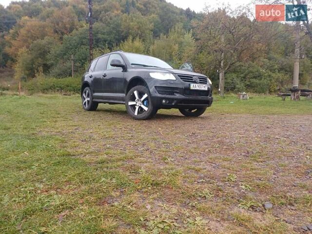 Черный Фольксваген Туарег, объемом двигателя 4.92 л и пробегом 295 тыс. км за 10500 $, фото 1 на Automoto.ua