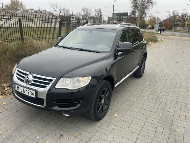 Черный Фольксваген Туарег, объемом двигателя 3 л и пробегом 373 тыс. км за 5400 $, фото 1 на Automoto.ua