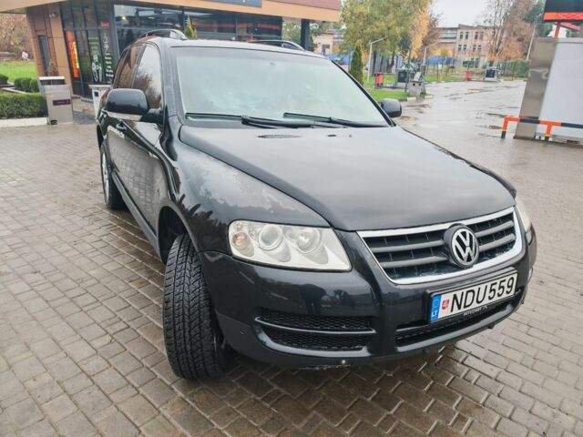 Черный Фольксваген Туарег, объемом двигателя 3 л и пробегом 397 тыс. км за 7700 $, фото 1 на Automoto.ua
