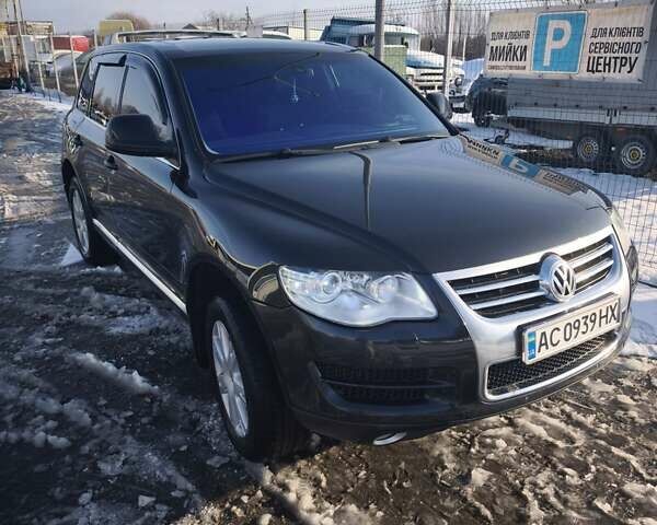Черный Фольксваген Туарег, объемом двигателя 2.97 л и пробегом 294 тыс. км за 13000 $, фото 1 на Automoto.ua