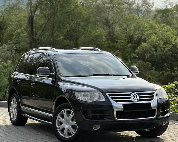 Черный Фольксваген Туарег, объемом двигателя 2.97 л и пробегом 305 тыс. км за 10800 $, фото 1 на Automoto.ua