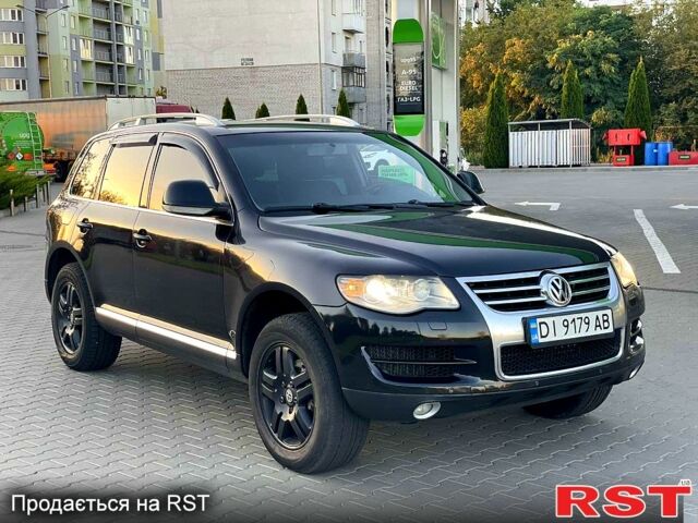 Черный Фольксваген Туарег, объемом двигателя 3 л и пробегом 258 тыс. км за 10800 $, фото 1 на Automoto.ua