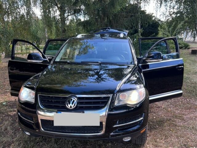 Черный Фольксваген Туарег, объемом двигателя 3.6 л и пробегом 242 тыс. км за 9500 $, фото 1 на Automoto.ua