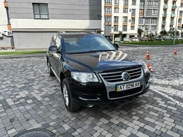 Черный Фольксваген Туарег, объемом двигателя 3 л и пробегом 267 тыс. км за 11000 $, фото 1 на Automoto.ua