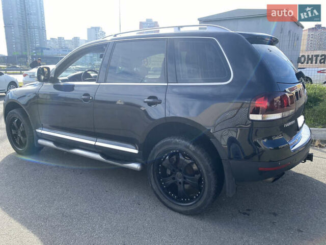 Черный Фольксваген Туарег, объемом двигателя 3 л и пробегом 240 тыс. км за 13000 $, фото 1 на Automoto.ua