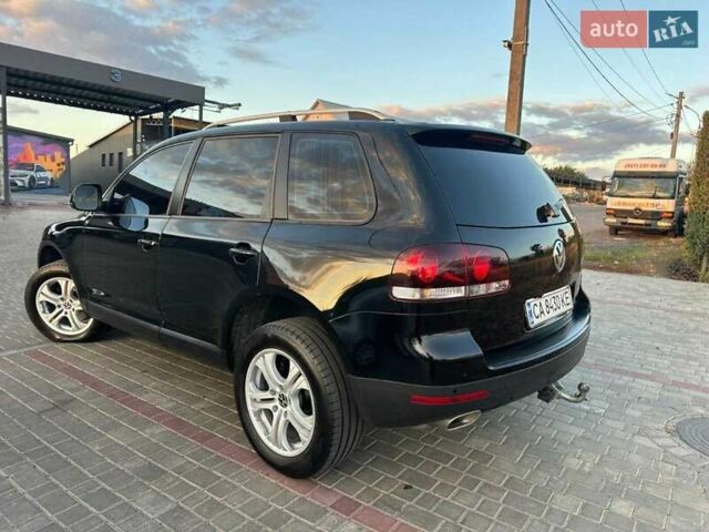 Черный Фольксваген Туарег, объемом двигателя 3 л и пробегом 198 тыс. км за 13086 $, фото 1 на Automoto.ua