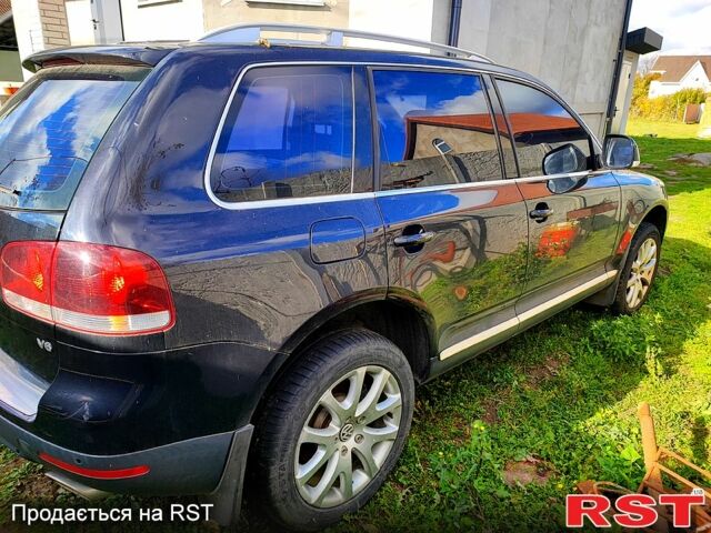 Черный Фольксваген Туарег, объемом двигателя 3.6 л и пробегом 280 тыс. км за 8000 $, фото 1 на Automoto.ua