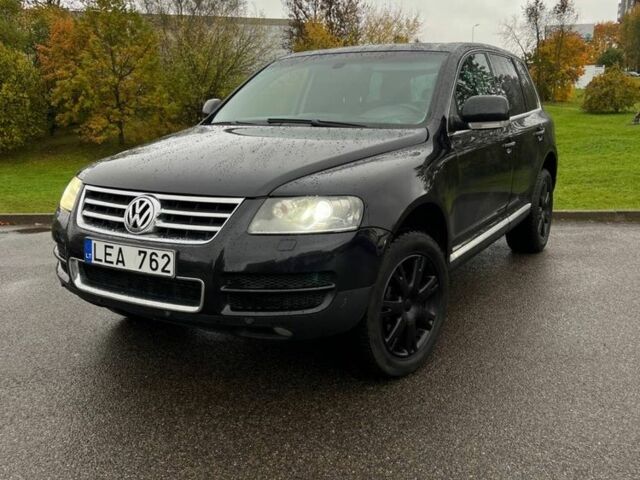 Черный Фольксваген Туарег, объемом двигателя 3 л и пробегом 280 тыс. км за 4900 $, фото 1 на Automoto.ua