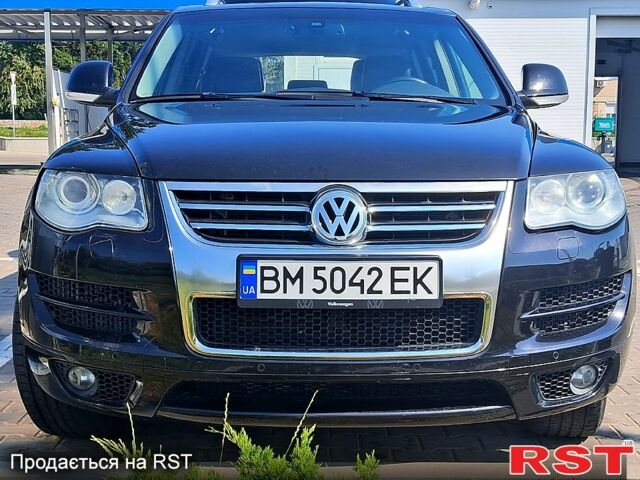 Черный Фольксваген Туарег, объемом двигателя 3 л и пробегом 337 тыс. км за 12000 $, фото 1 на Automoto.ua