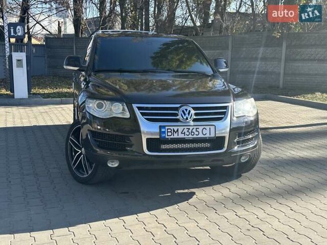 Черный Фольксваген Туарег, объемом двигателя 4.2 л и пробегом 286 тыс. км за 8999 $, фото 1 на Automoto.ua